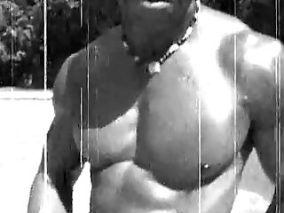 Draped Homosexual Hunk J.r. Langdon Strokes His Big Black Lollipop By The Pool
