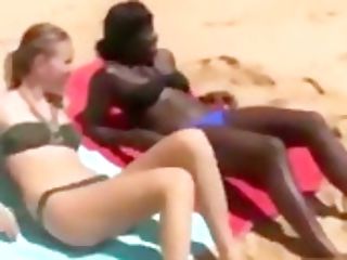 Dude Fucks Black And Milky Chicks On The Beach